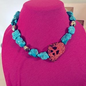 Handmade 18 inch necklace with peace sign , coral bead, and turquoise.
